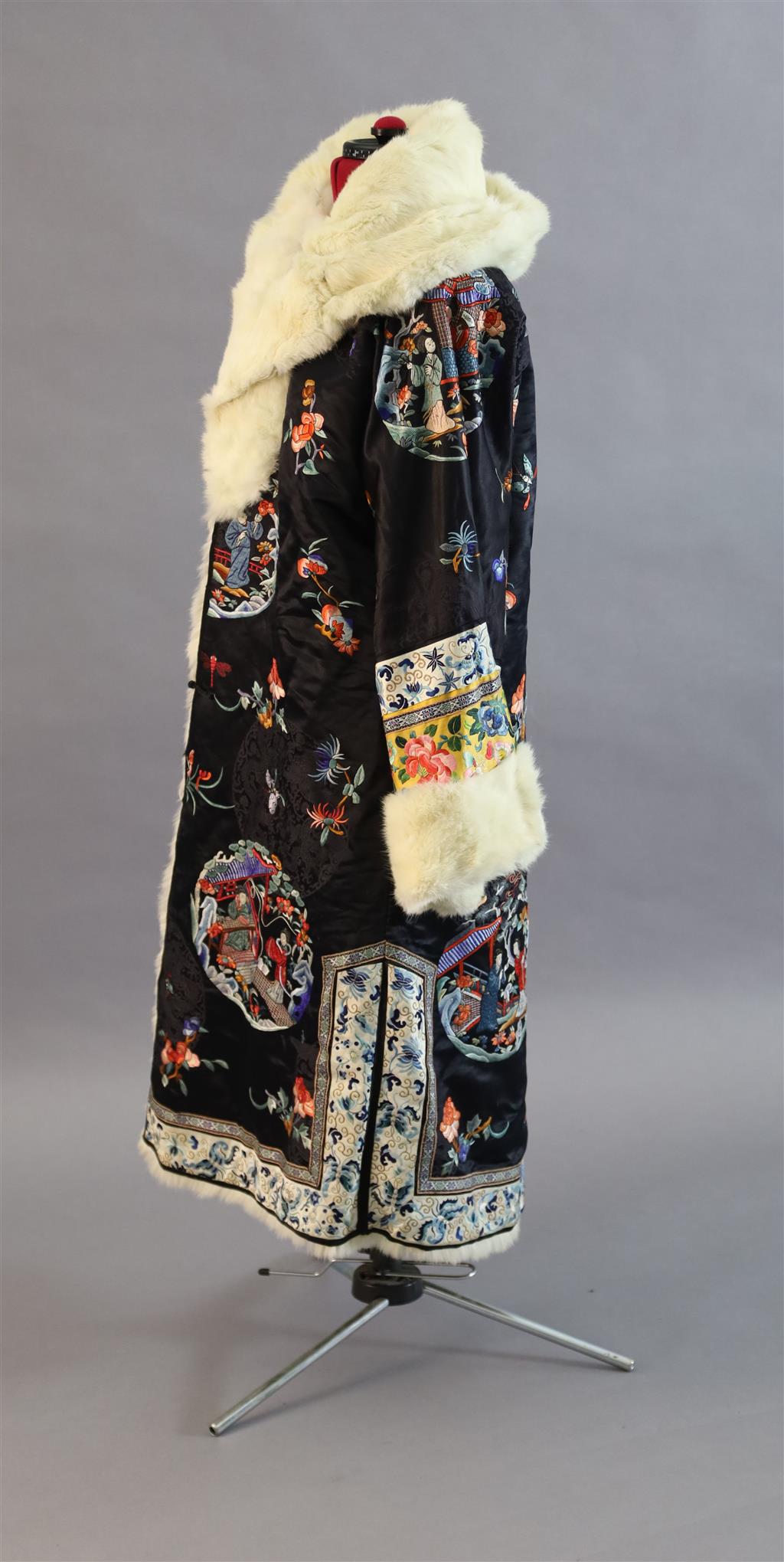 A Chinese silk embroidered winter robe, late 19th century/early 20th century, length 125cm